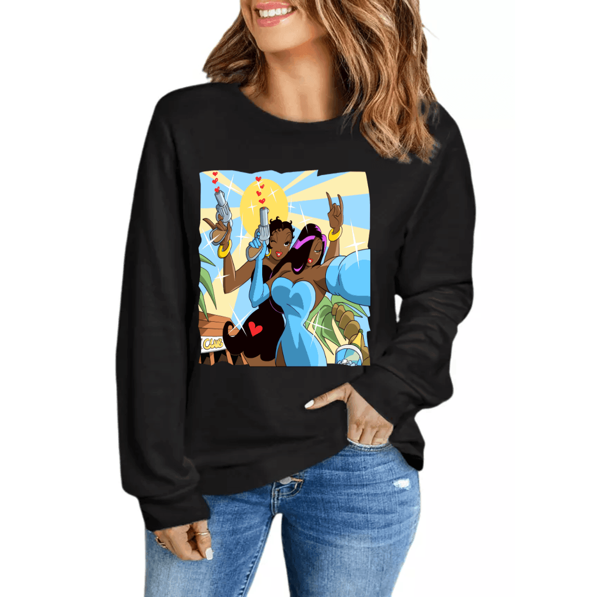 Woman wearing black sweatshirt with graphic depicting two cartoon women holding guns in a sunny outdoor setting.
